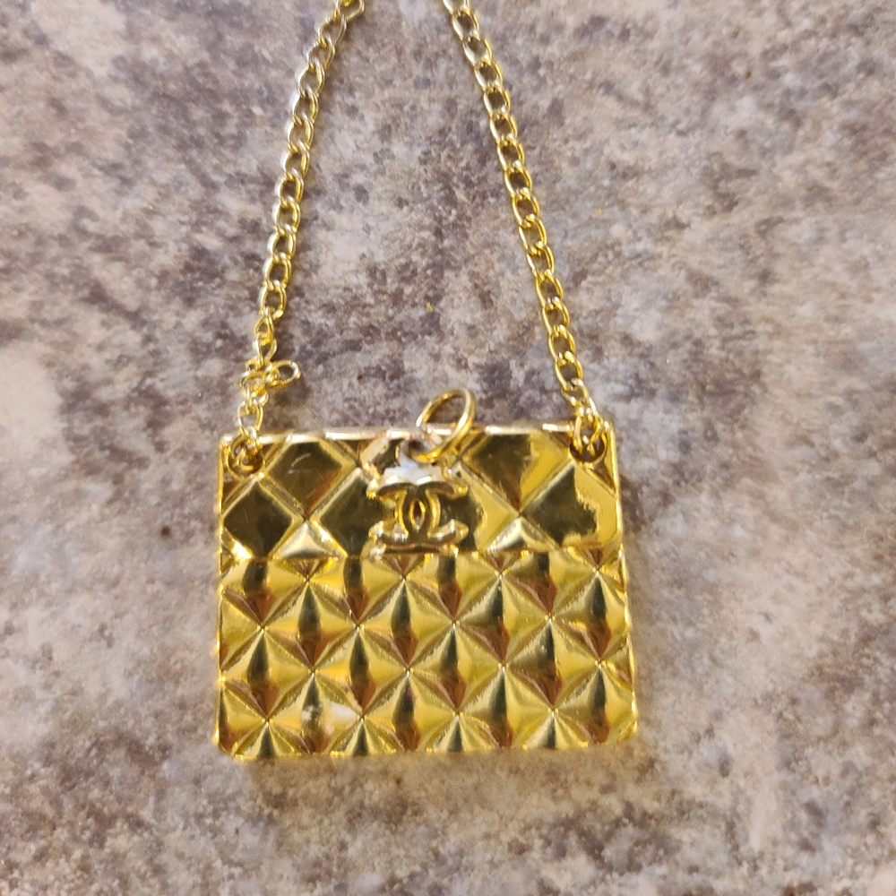 Authentic vintage Chanel handbags charm